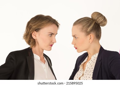 two business women swear on a white background
