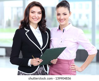 Two Business Women Team At Office Building