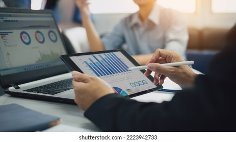 Two businessman consult analyzing company financial cash flow result. Concept for teamwork business corporate and economy fund. - Shutterstock ID 2223942733