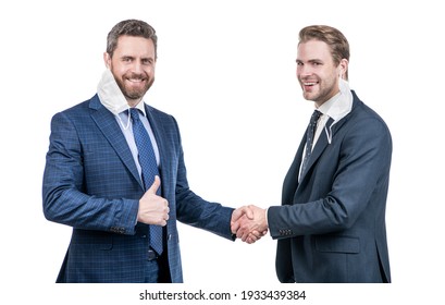 Two Businessmen Colleagues In Respirator Mask Shaking Hands After Successful Business Deal During Coronavirus Pandemic, Partners.