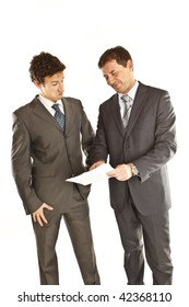 Two businessmen looking at documents