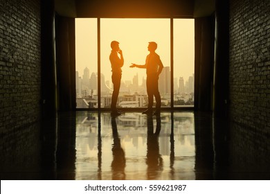 Two businessmen are negotiating business in office on the building.
Two businessmen business negotiations.(Silhouette) - Shutterstock ID 559621987