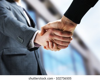 Two Businessmen Shaking Hands.