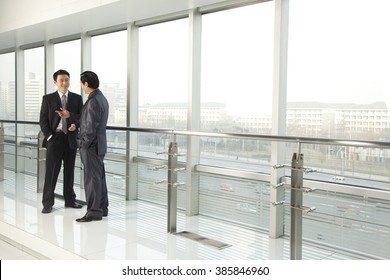 Two Businessmen Talking