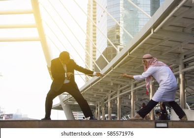 Two Businesspeople Hand Playing Tug Of War outdoor, international businessman - Shutterstock ID 585571976