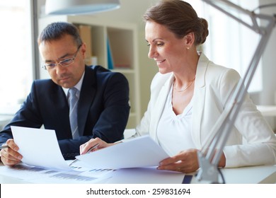 Two Businesspeople Sharing Information