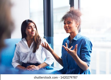 Two Businesswomen In Conference Room