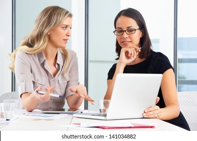 Two Businesswomen Meeting In Office