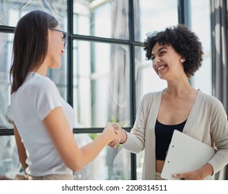 Two Businesswomen Shaking Hands In Modern Office - Shutterstock ID 2208314511
