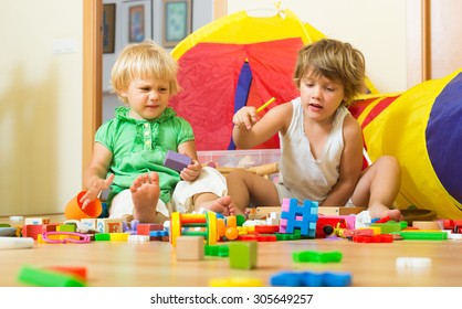 Two Calm Little Children Playing Toys Stock Photo 305649257 | Shutterstock