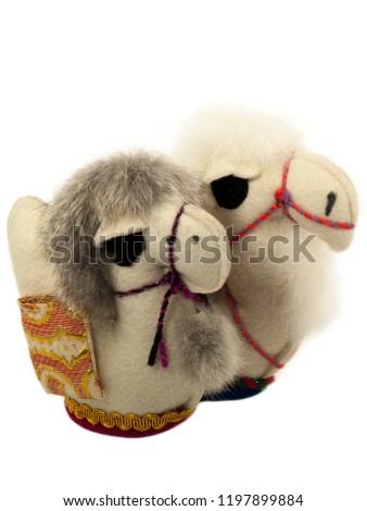Two camel toys on a white background. Isolated.