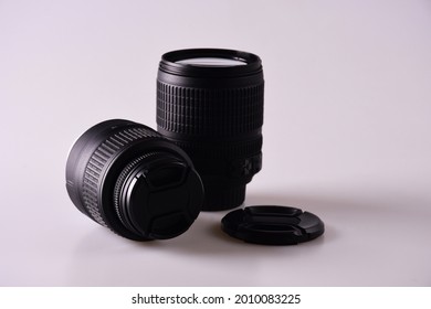 Two camera lenses with white background