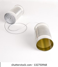 Two Cans Strung Together With Metal Wire Walkie Talkie
