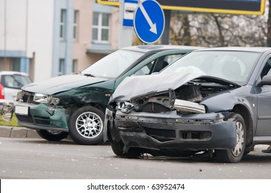 Two Car Crash Accident On A Road In City