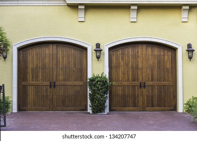 Two Car Wooden Arch Garage In South Florida