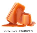 Two caramel candies and milk caramel sauce isolated on a white background