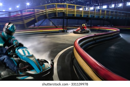 Two Cart Racers Are Racing On The Grand Track Motion