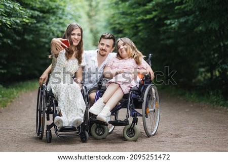 Similar – Daughter hugging senior mother in wheelchair