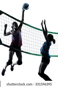 Two Caucasian Women Volleyball In Studio Silhouette Isolated On White Background