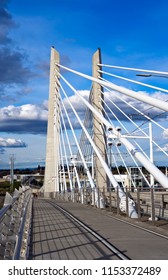 Two Central Support Columns With Rope Stretching Of Pedestrian, Bicycles And Transportation Tilikum Crossing Bridge With Railway For Streetcar Across The Willamette River In Portland Oregon