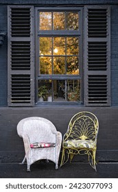 Two Chairs in front of the window