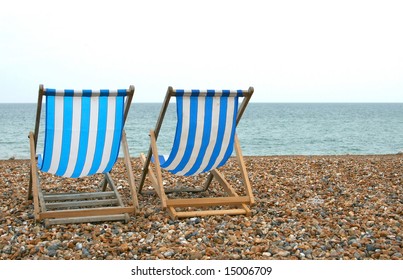 Two Deck Chairs On Pebble Beach Stock Photo Edit Now 211023202   Two Chairs On Beach 260nw 15006709 