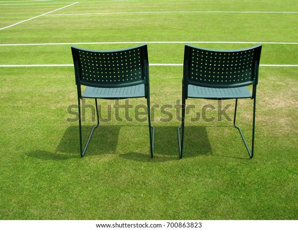 Two Chairs On Grass Tennis Court Stock Image Download Now