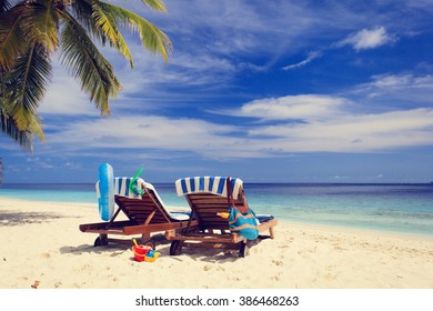 Two Chairs On The Tropical Beach