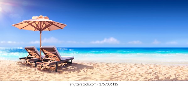 Two Chairs And Parasol With Blurred Sea Background - Powered by Shutterstock