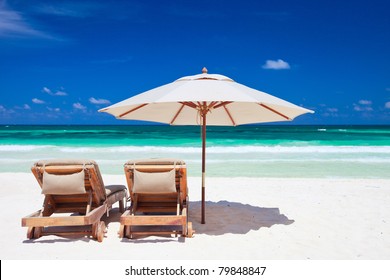 Two Chairs And Umbrella On Stunning Tropical Beach In Tulum, Mexico