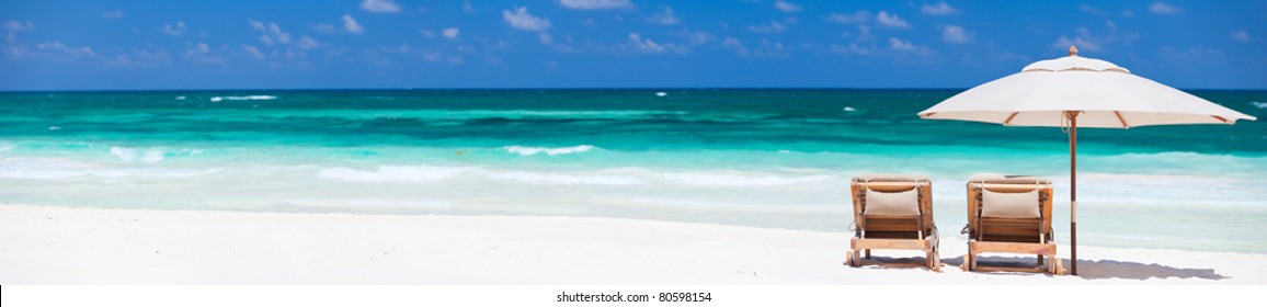 Two Chairs And Umbrella On Stunning Tropical Beach In Tulum, Mexico