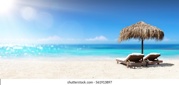 Two Chairs Under Parasol In Tropical Beach
