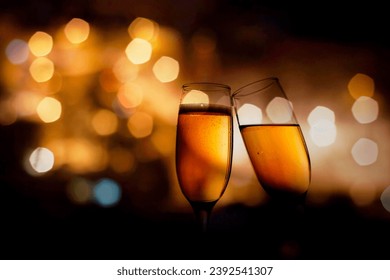 two champagne glasses on New Year eve - Powered by Shutterstock