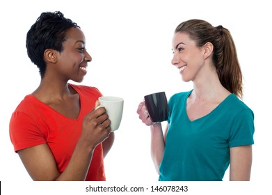 Two charming friends enjoying coffee