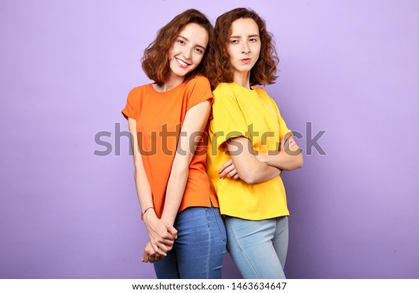 Two Cheerful Positive Girls Twins Smiling Foto De Stock 1463634647