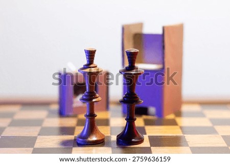 Two chess kings facing off in front of a polling station, representing the concepts of direct competition, leadership, and the clash of ideas