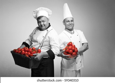 Two chief with tomato