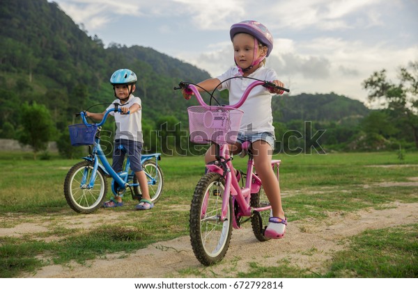 child riding bicycle