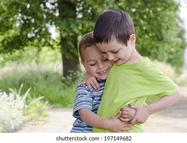 Two Children Brothers Playing Hugging Park Stock Photo 197149682 ...