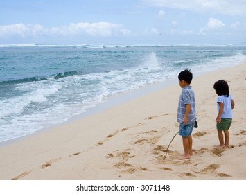 two children discovering the ocean - Powered by Shutterstock