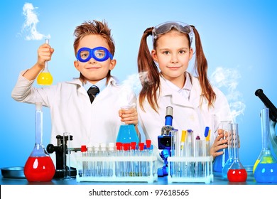 Two children making science experiments. Education. - Powered by Shutterstock