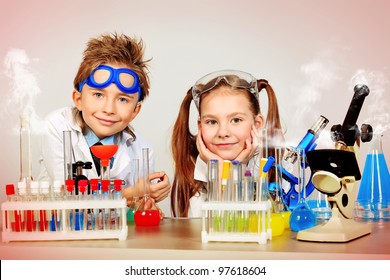 Two children making science experiments. Education. - Powered by Shutterstock