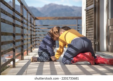 Two Children Playing Catch Ants. Funny Moment Of Complicity And Discovery. Happy Childhood.