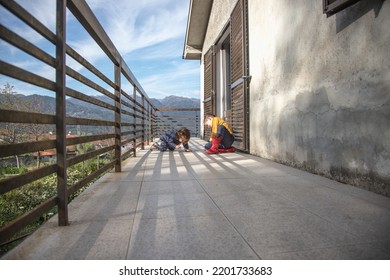 Two Children Playing Catch Ants. Funny Moment Of Complicity And Discovery. Happy Childhood.