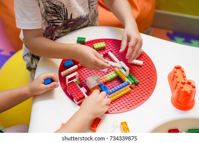 Two Children Playing Together