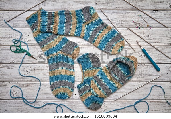 Two Childrens Knitted Socks Slippers On Stock Photo Edit