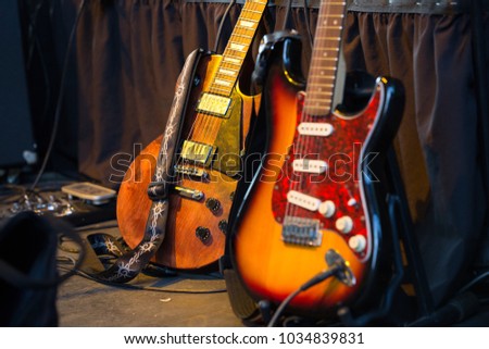 Two classic electric guitars ready to be played in a music studio. Musical Instrument. Concept: Creativity, be able to create. 