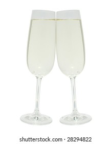 Two clinking glasses with champagne isolated on white background with clipping path