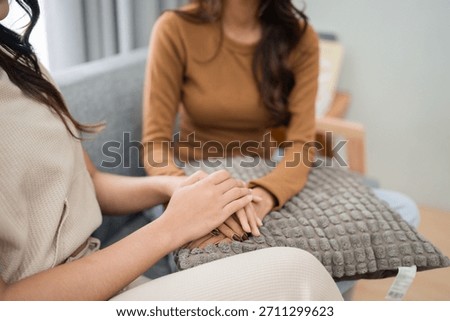 Two close friends steadfastly supporting each other as they share a heartfelt moment together