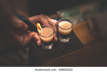 Two Cocktails With Lighter